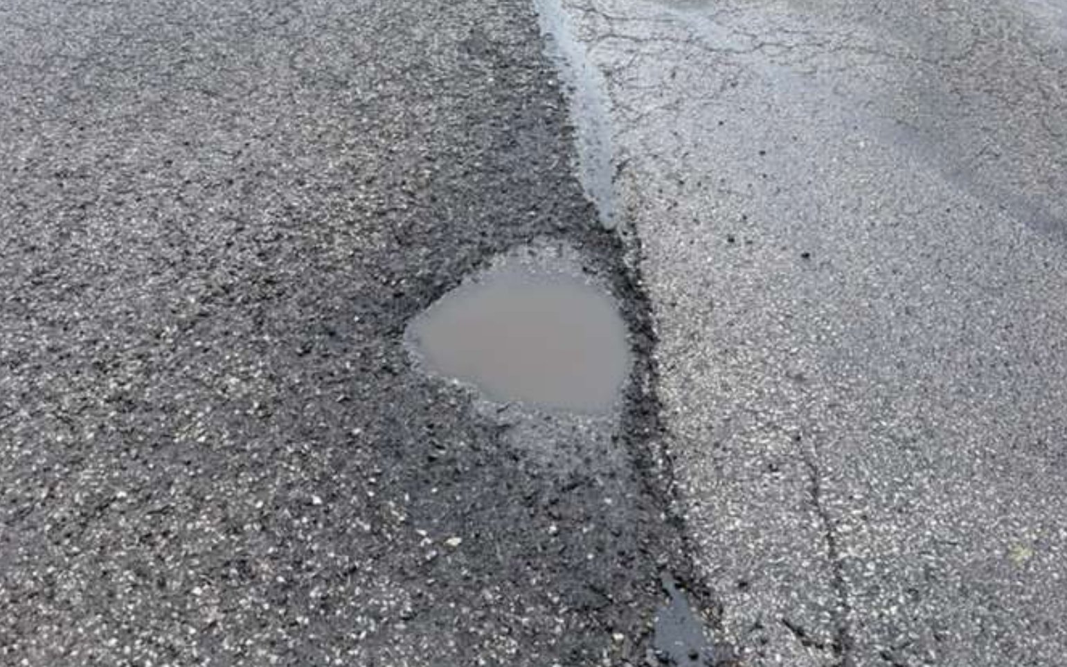 Pothole damage before repair